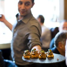 Waiter serving canapes